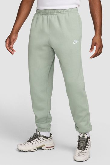 Buy Nike Green Club Cuffed Joggers from Next Poland