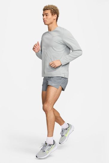 Buy Nike Dri FIT UV Miler Long Sleeve Running Top from Next Turkey