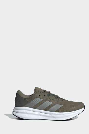 Green running trainers store