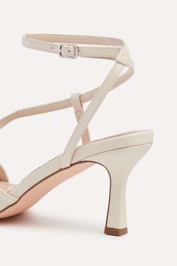 Buy Linzi Nude Cassie Wide Fit Mid Heel Strappy Sandals With Ankle Strap from Next Bahrain