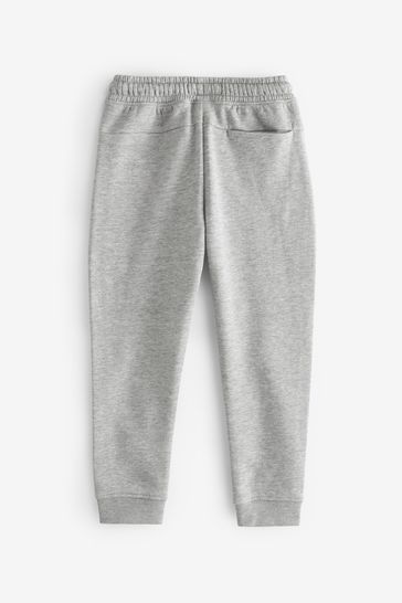 Grey joggers with zip pockets top
