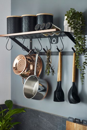 Wall mounted pan holder discount