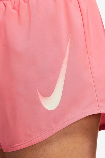Buy Nike Coral Pink Dri FIT Nike Swoosh Women s Brief Lined Running Shorts from Next Denmark