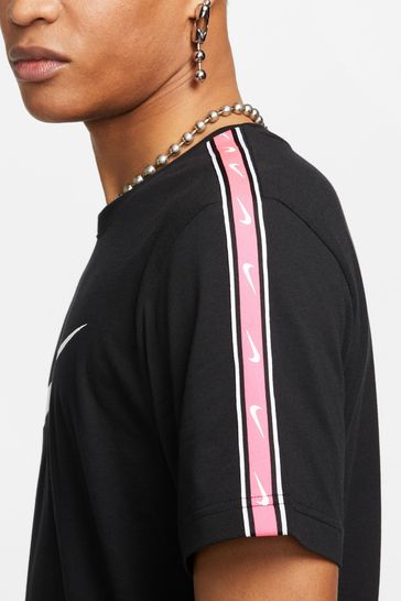 Black nike with top pink swoosh