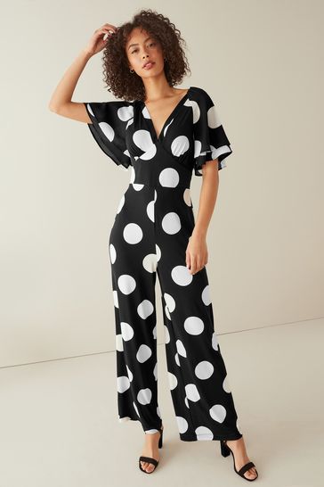 Buy Black Spot Flute Sleeve V Neck Jumpsuit from Next Luxembourg