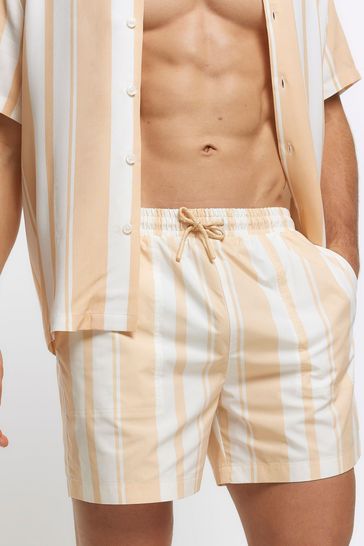 Buy River Island Elasticated White Yellow Pocket Swim Shorts from Next Turkey