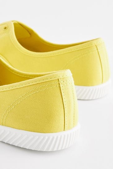 Buy Lime Green Slip On Canvas Shoes from Next Netherlands