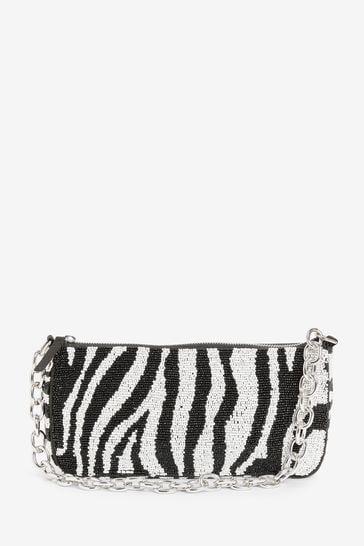 Black and white store zebra print clutch bag