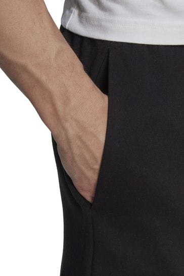 Adidas originals linear fleece cargo joggers hot sale