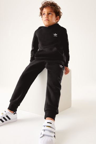 Conjunto negro con capucha para bebé Adicolor de Adidas Originals