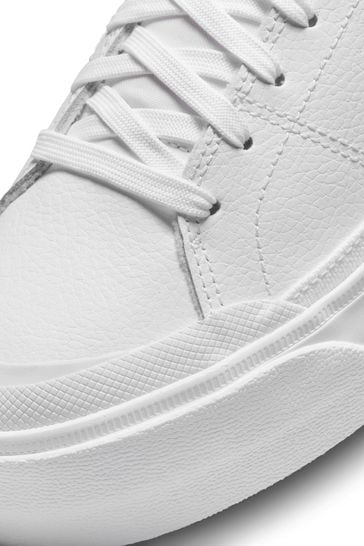 Nike white top leather trainers