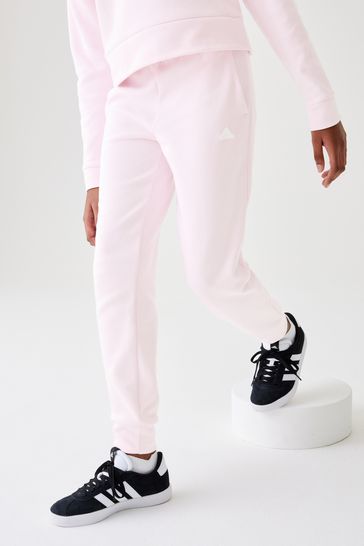 Adidas light pink tracksuit new arrivals