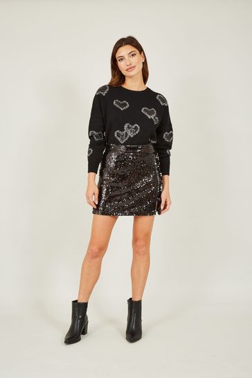 Black sequin mini sales skirt outfit