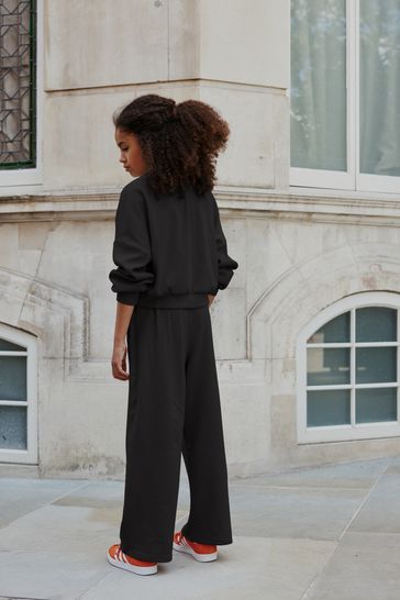 Black wide leg jogging bottoms outlet