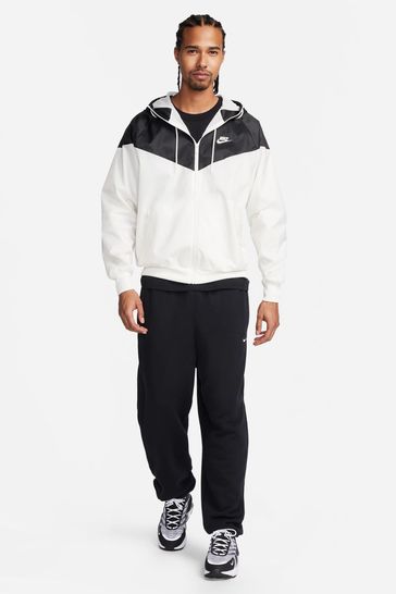 Nike windrunner on sale jacket black white