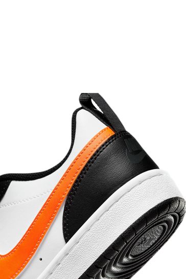 Black orange sales and white nikes