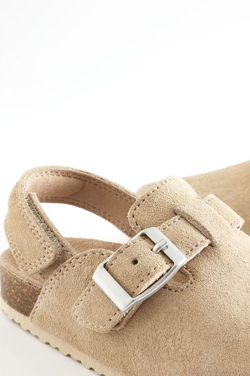 Brown suede clogs top