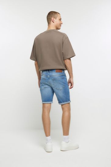 Buy River Island Blue Skinny Rips Denim Shorts from Next Luxembourg