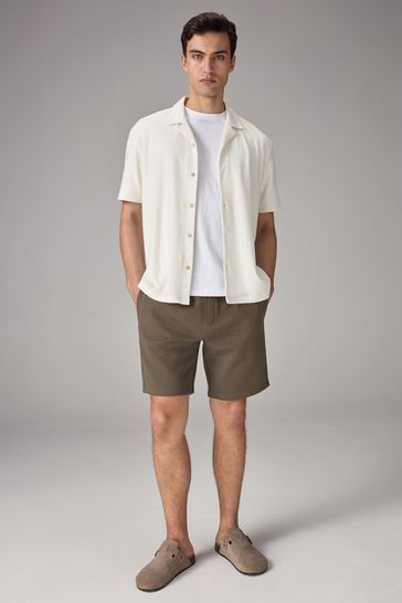 Knee length jersey shorts store