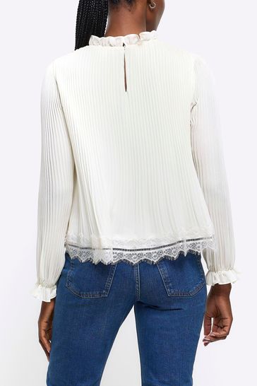 White high neck ruffle store blouse
