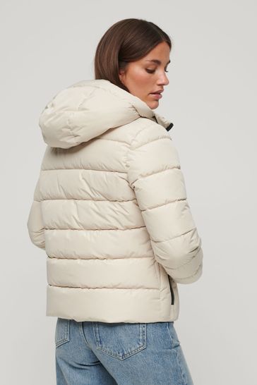 Nude hooded store puffer jacket