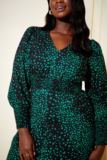 Green and black spot dress 2025