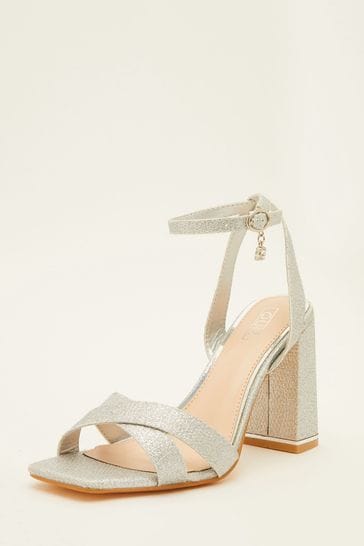 Quiz silver shimmer hotsell cross strap sandals