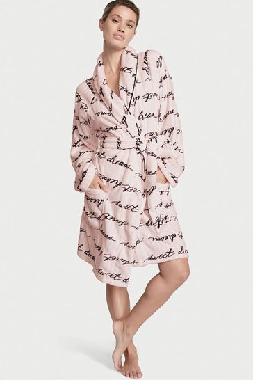 With a shawl collar, tie waist, and front pockets, this robe is perfect for treating herself.