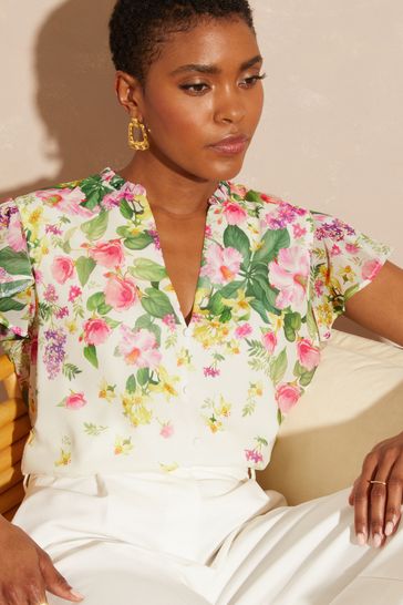 White ruffle sales v neck blouse