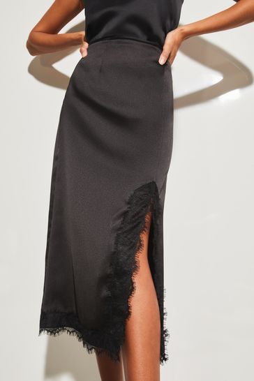 Buy Lipsy Black Satin Bias Cut Midi Skirt with Lace Detailing from