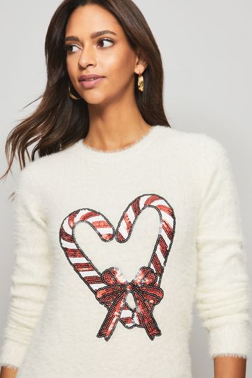Buy Lipsy Ivory Regular Sequin Bow bardot Christmas Jumper Dress