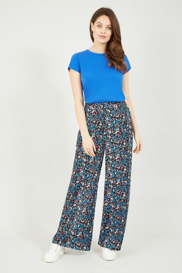 Buy Yumi Floral Print Wide Leg Trousers 