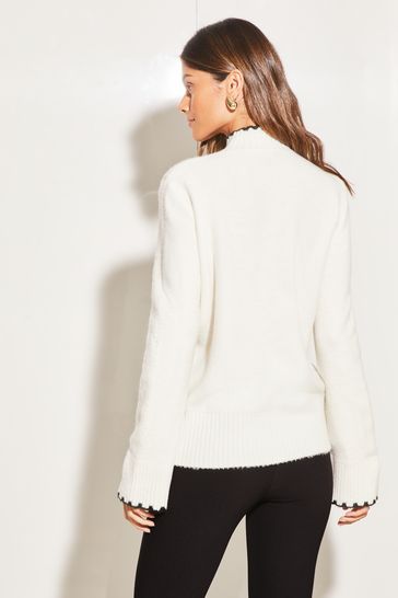 Buy Lipsy Ivory White Whipstitch High Neck Flute Sleeve Knitted