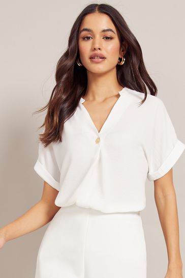 White short sale sleeve blouse