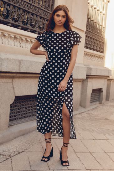 Friends Like These Black Spot Chiffon Flutter Sleeve Midi Dress