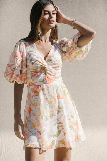 Buy Lipsy White Print Puff Sleeve V Neck Twist Skater Dress from Next Poland