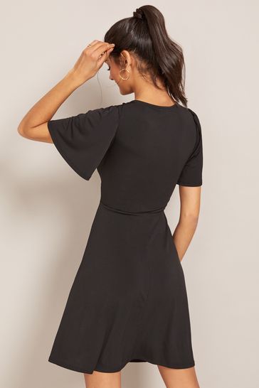 Black short dress with sleeves discount