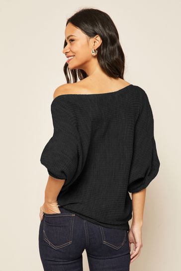 Buy Friends Like These Black Petite Batwing Knitted Off The Shoulder Jumper from Next Hungary