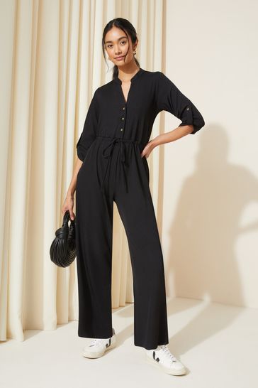 Friends Like These Black Jersey Long Sleeve Cinched Waist Jumpsuit