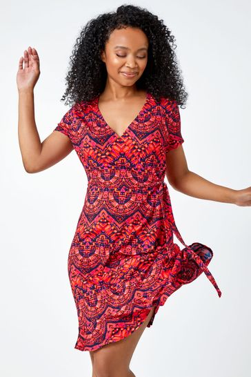 Buy Roman Roman Petite Patterned Tie Detail Wrap Dress from the Laura Ashley online shop