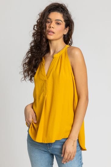 Mustard yellow vest on sale top
