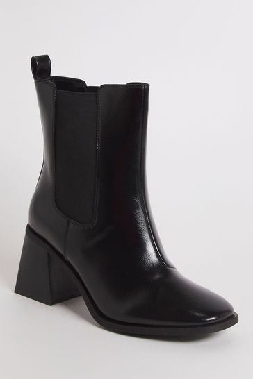 Wide fit best sale heeled boots uk