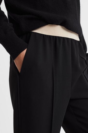 elasticated waistband tapered trousers