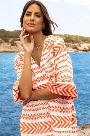 Orange embroidered dress top