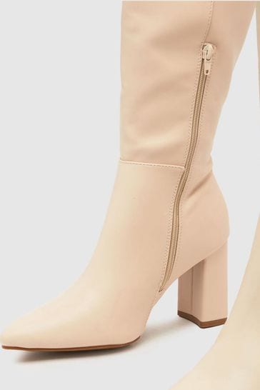 Beige block heel boots top