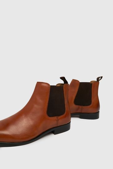 Divided chelsea boots online