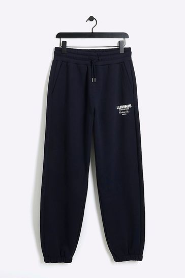 Buy River Island Blue Luminis Spray Printed Joggers from Next Saudi Arabia