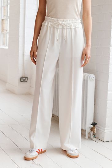 Buy White Textured Elasticated Wide Leg Trousers from Next Poland