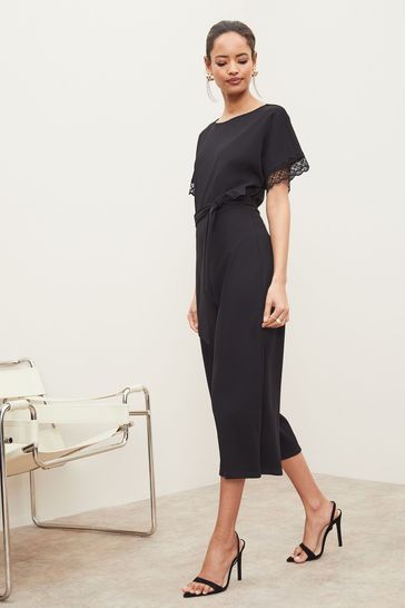 Buy Lipsy Black Lace Trim Culotte Jumpsuit from Next Luxembourg