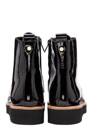 Black patent on sale leather flat boots